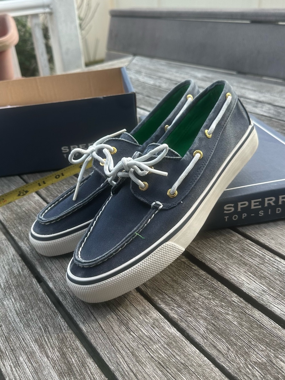 Brand new Sperry women’s Navy Canvas Boat Shoes with White Laces